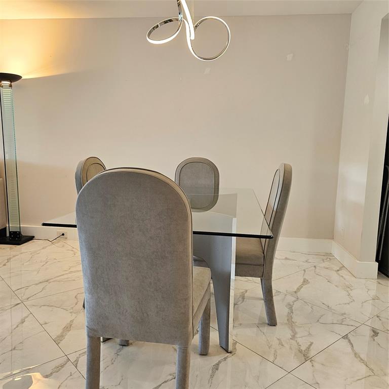 1705 Andros Isle, Unit C3 Coconut Creek, FL 33066 - Photo 29 of 36 a workspace with furniture and a window