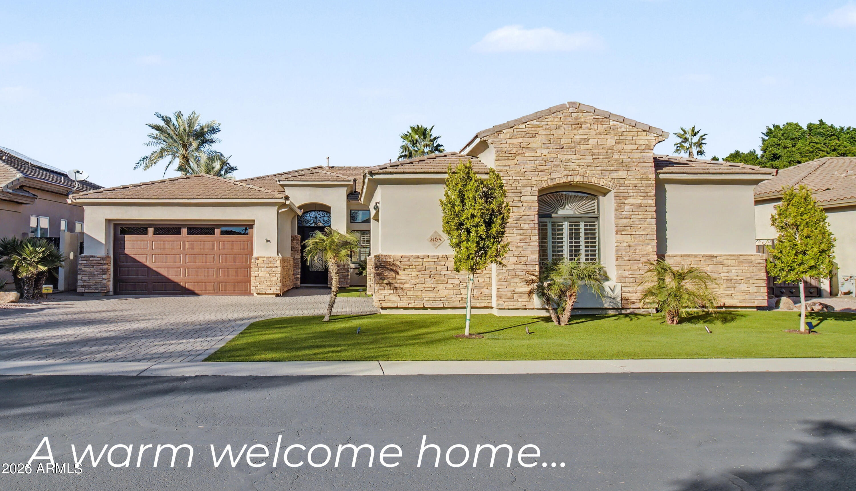 2184 West Weatherby Way Chandler, AZ 85286 - Photo 1 of 60 a view of a house with a swimming pool and a yard