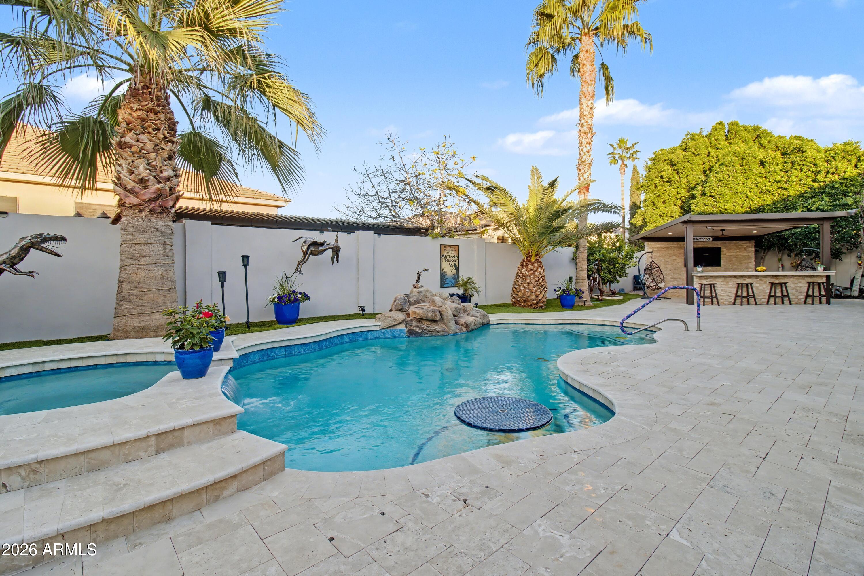 2184 West Weatherby Way Chandler, AZ 85286 - Photo 19 of 60 a view of a backyard with a patio