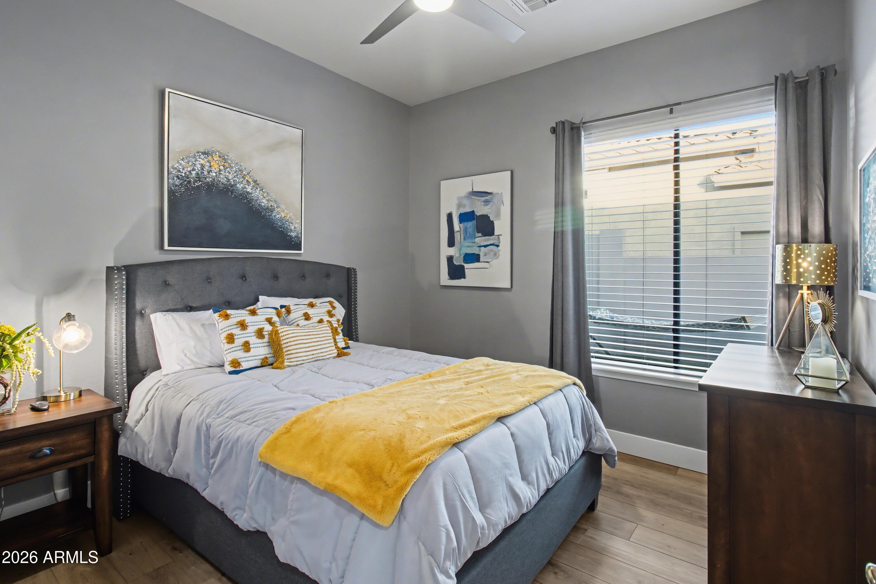 2184 West Weatherby Way Chandler, AZ 85286 - Photo 41 of 60 a bedroom with a bed and a window