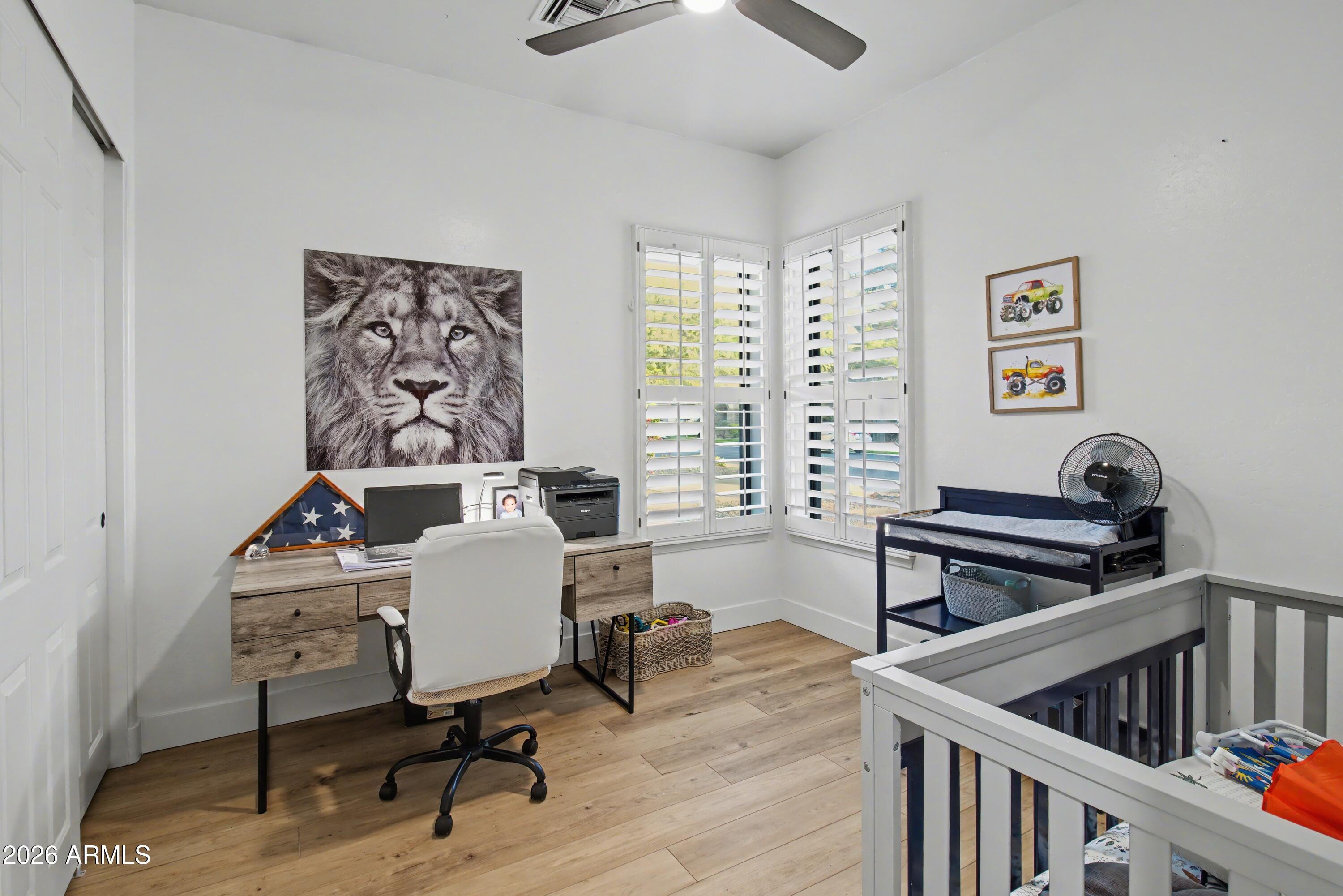 2184 West Weatherby Way Chandler, AZ 85286 - Photo 42 of 60 a workspace with furniture and rug