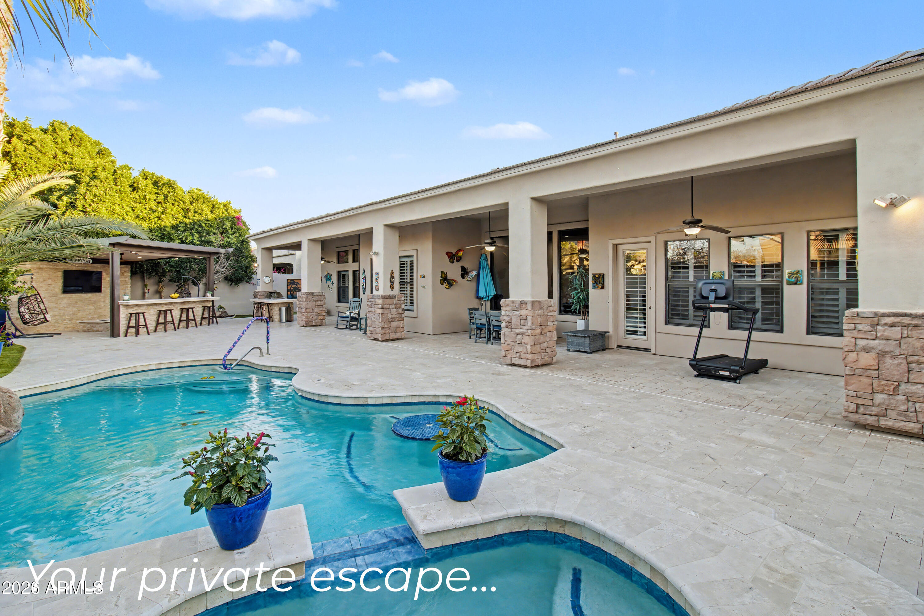 2184 West Weatherby Way Chandler, AZ 85286 - Photo 5 of 60 a front view of a house with outdoor seating