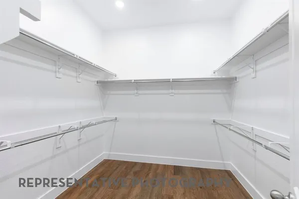 a view of an empty walk in closet
