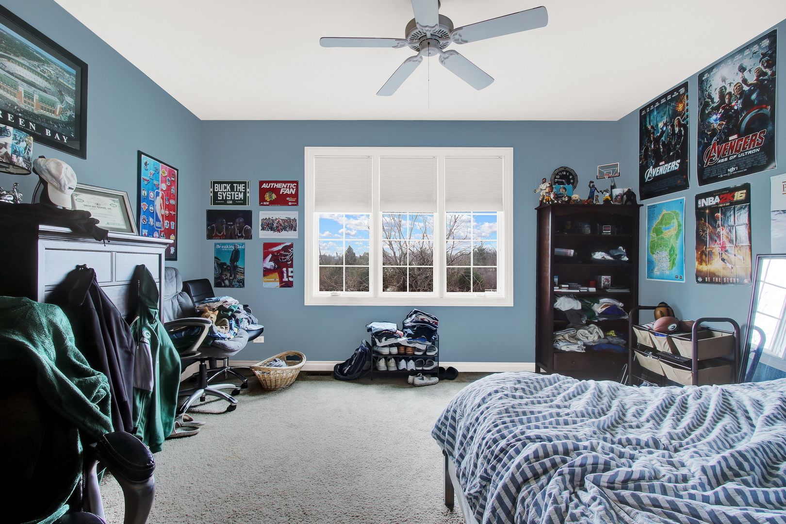 17451 Bridle Trail Road Gurnee, IL 60031 - Photo 102 of 121 a bed room with a bed a computer on a desk and a book shelf