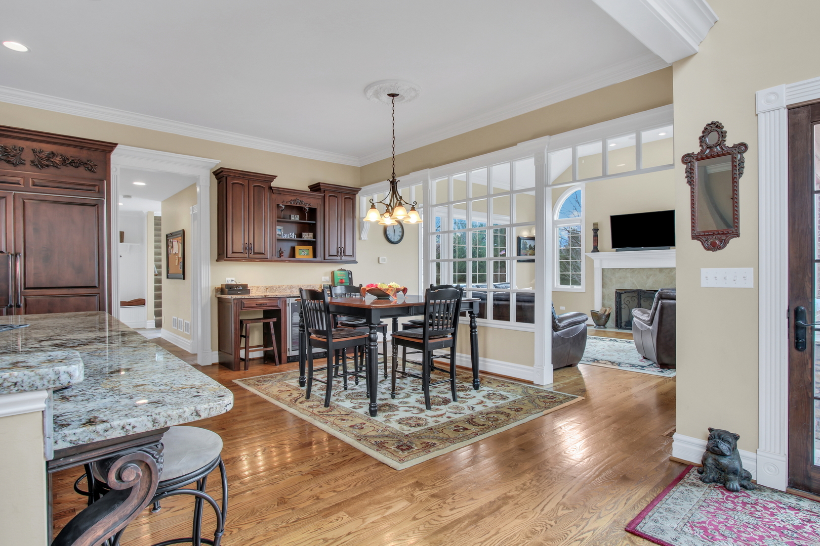 17451 Bridle Trail Road Gurnee, IL 60031 - Photo 15 of 121 a living room with furniture a fireplace and a flat screen tv