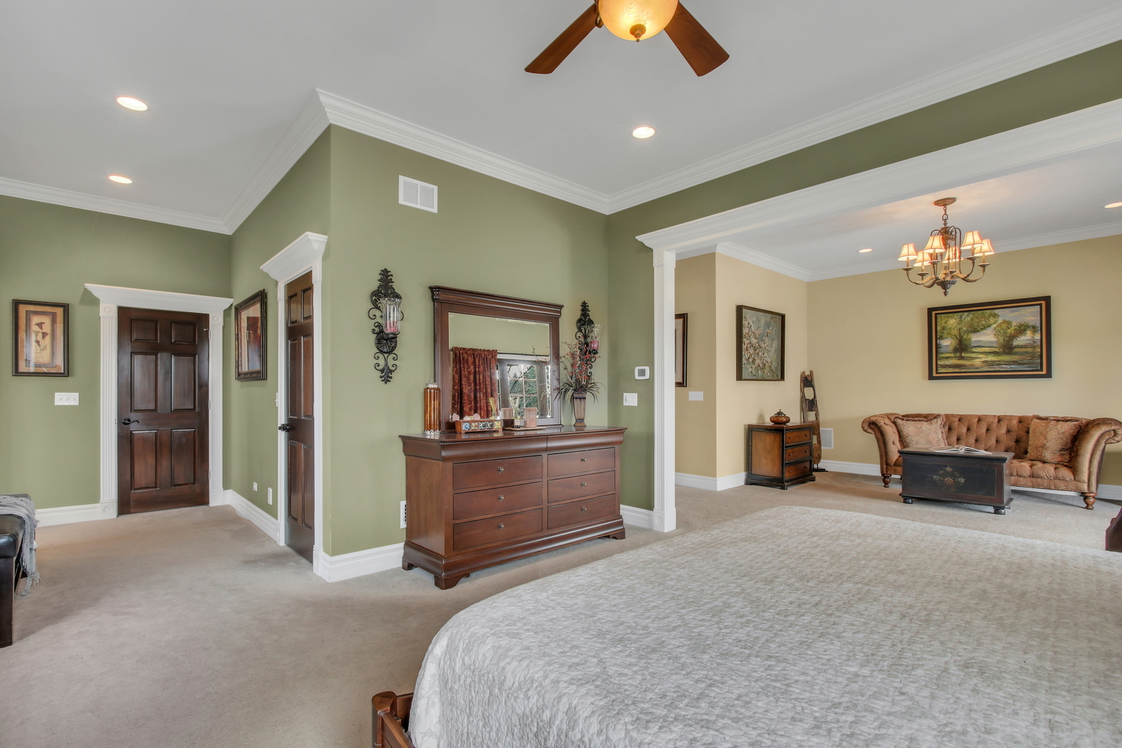 17451 Bridle Trail Road Gurnee, IL 60031 - Photo 23 of 121 a spacious bedroom with a bed and a chandelier