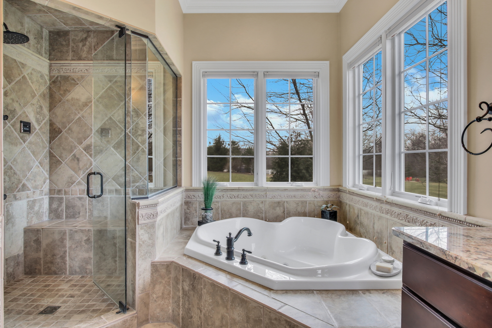 17451 Bridle Trail Road Gurnee, IL 60031 - Photo 24 of 121 a bathroom with a sink and a bathtub