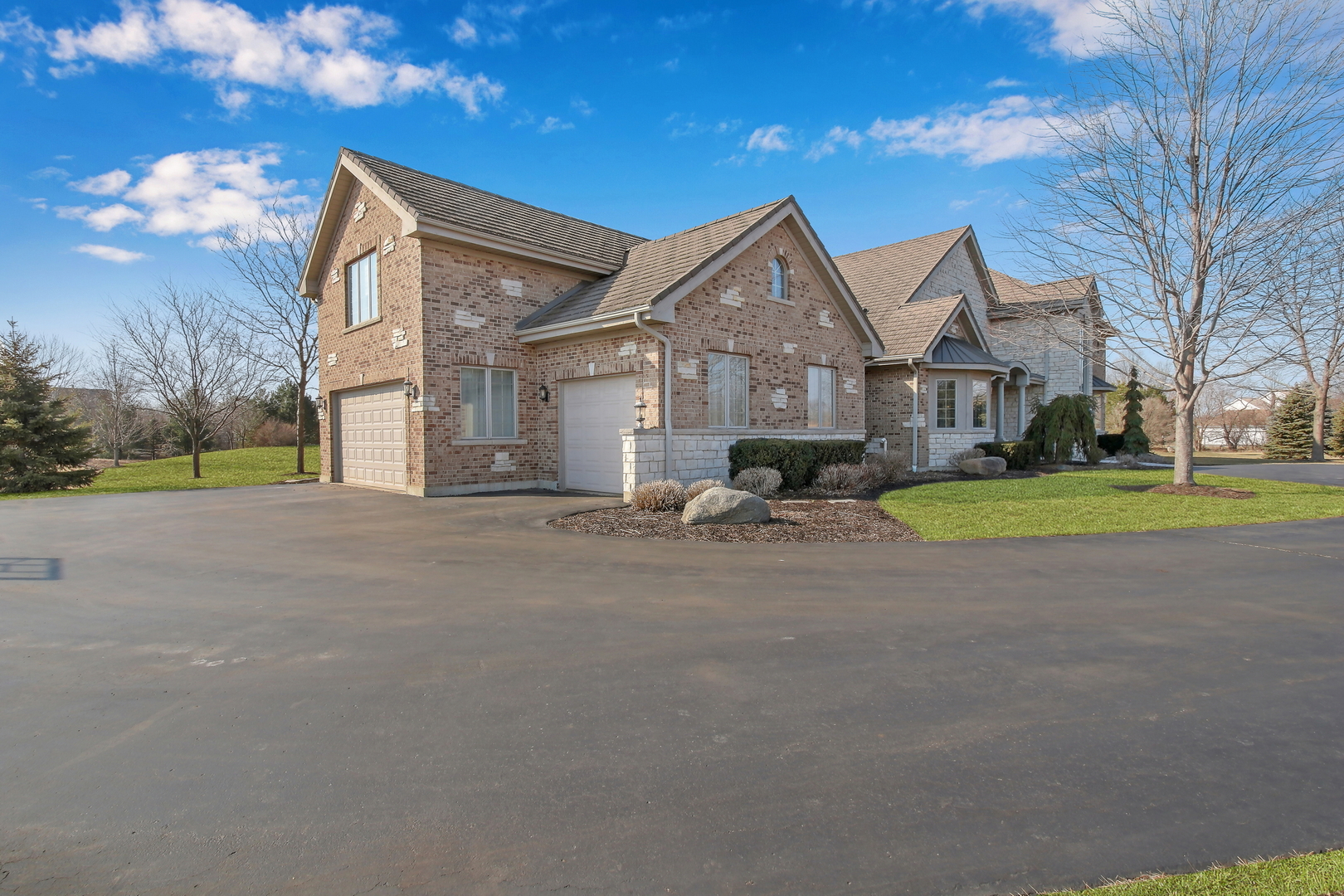 17451 Bridle Trail Road Gurnee, IL 60031 - Photo 41 of 121 a view of a house with a big yard and large trees