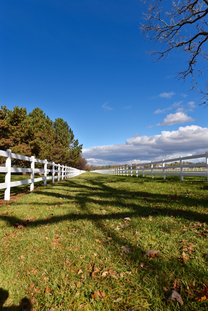 17451 Bridle Trail Road Gurnee, IL 60031 - Photo 65 of 121 a view of a lake with a building in the background