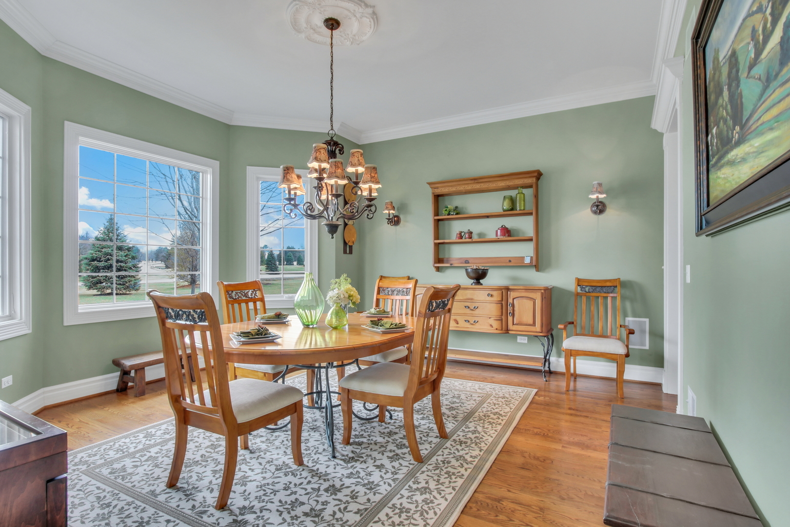 17451 Bridle Trail Road Gurnee, IL 60031 - Photo 80 of 121 a dining room with furniture a rug and a chandelier