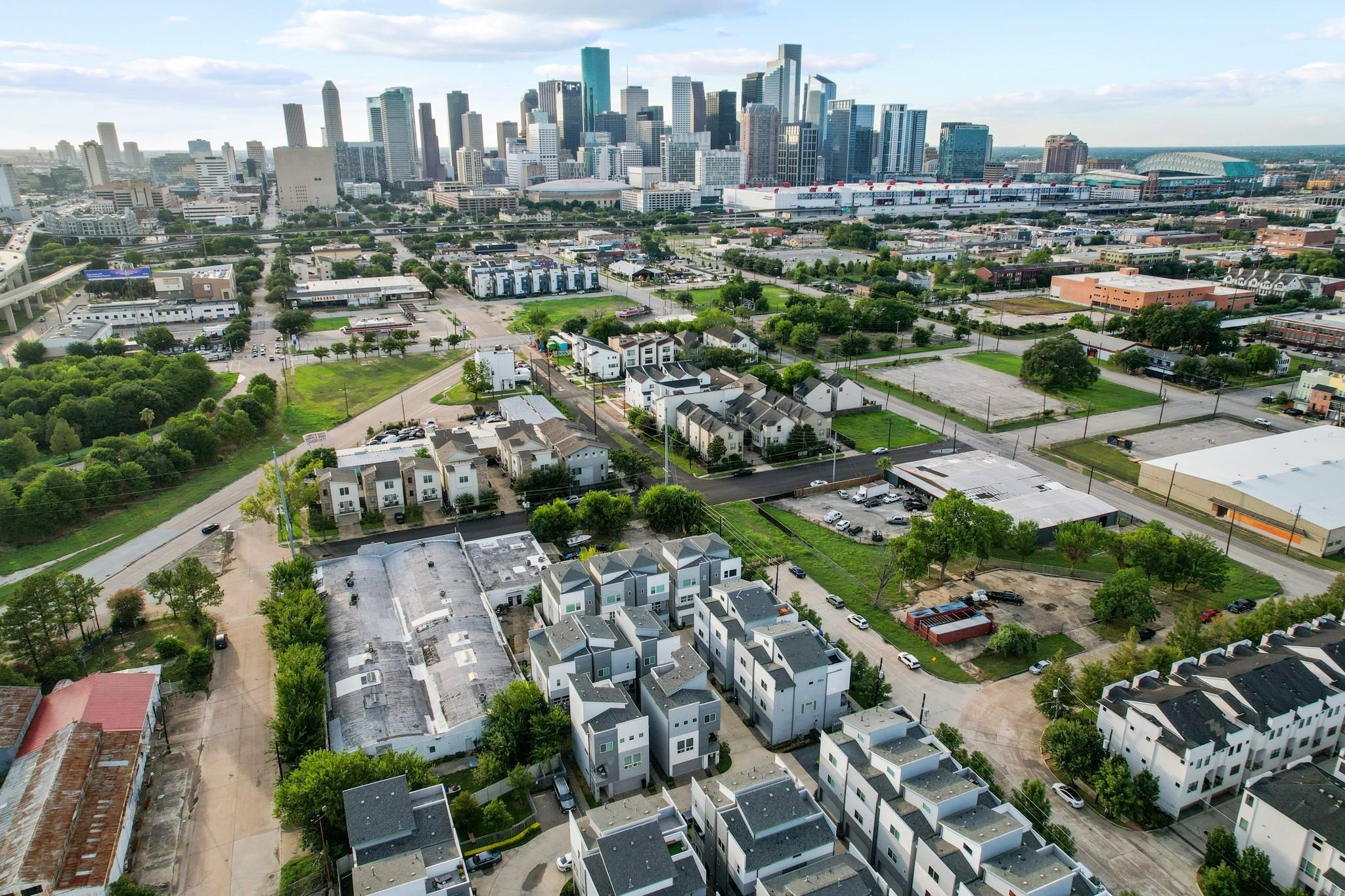 1705 Eado Point Lane Houston, TX 77003 - Photo 48 of 50 Modern townhouses are set in a green neighborhood with convenient proximity to downtown. Enjoy urban living with skyline views and easy access to city amenities.
