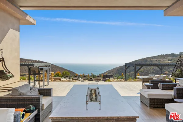 a bed room with a bed and a dresser