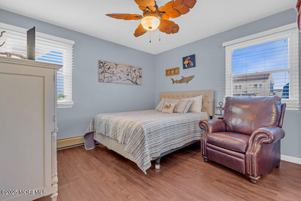 826 Forepeak Drive Forked River, NJ 08731 - Photo 21 of 56 a bedroom with a bed couch and window