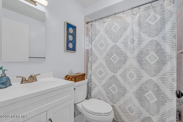 a room with chair and a wooden floor