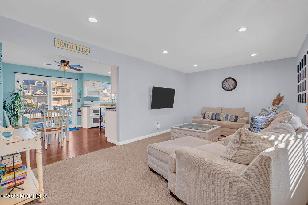 826 Forepeak Drive Forked River, NJ 08731 - Photo 3 of 56 a bedroom with furniture and a flat screen tv