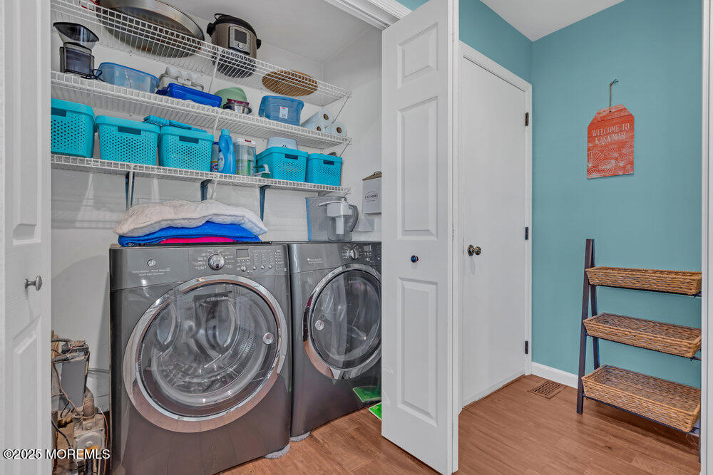 826 Forepeak Drive Forked River, NJ 08731 - Photo 38 of 56 a utility room with dryer and washer