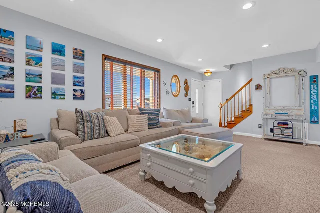 a living room with furniture and a couch