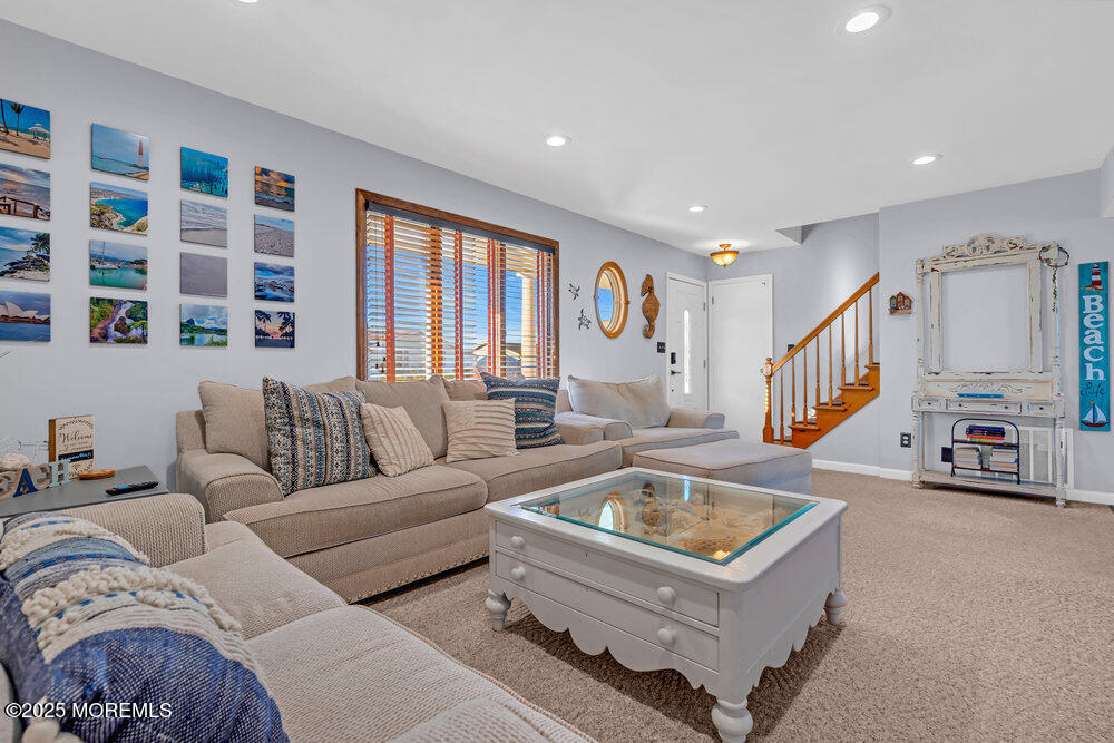 826 Forepeak Drive Forked River, NJ 08731 - Photo 4 of 56 a living room with furniture and a couch