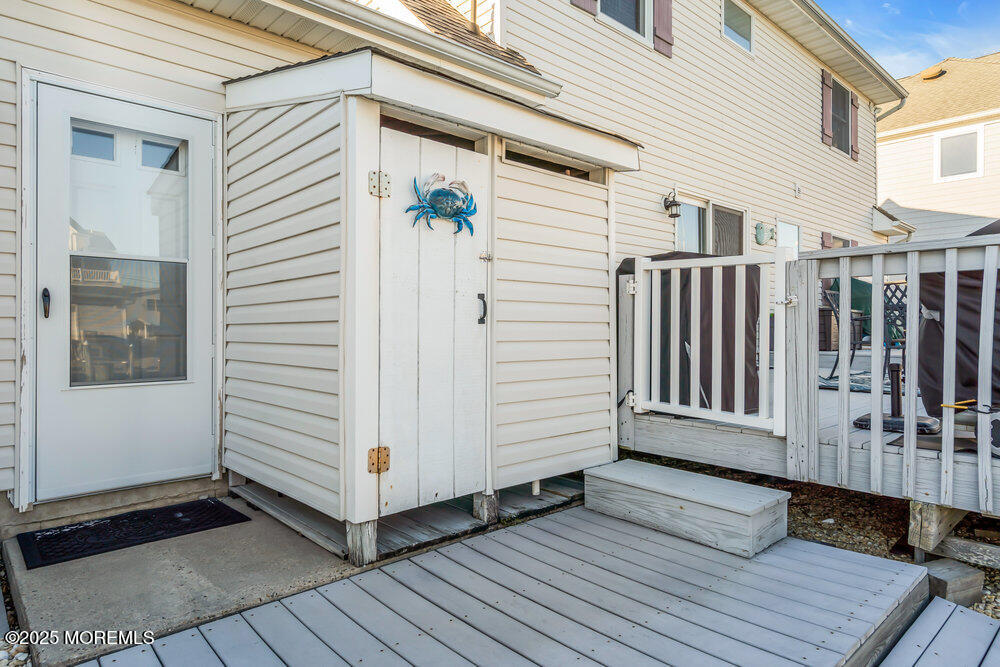 826 Forepeak Drive Forked River, NJ 08731 - Photo 41 of 56 a view of a house with a deck