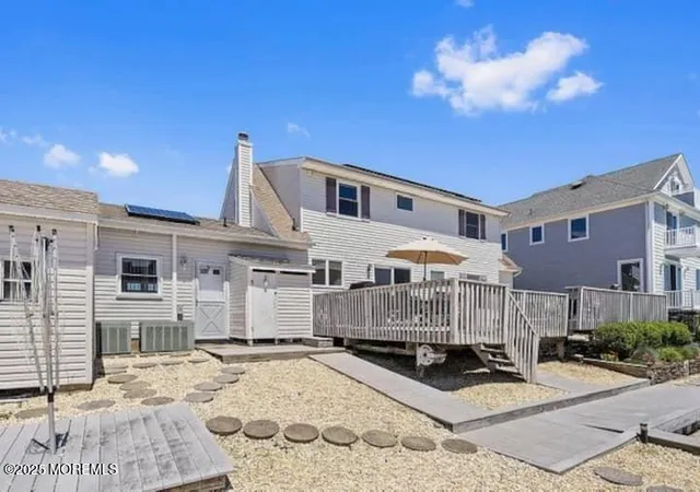 a view of houses with swimming pool