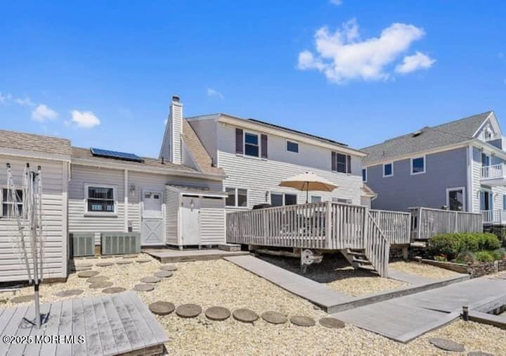 826 Forepeak Drive Forked River, NJ 08731 - Photo 47 of 56 a front view of a house with a yard