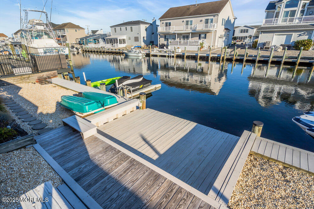 826 Forepeak Drive Forked River, NJ 08731 - Photo 50 of 56 a view of a lake with outdoor seating