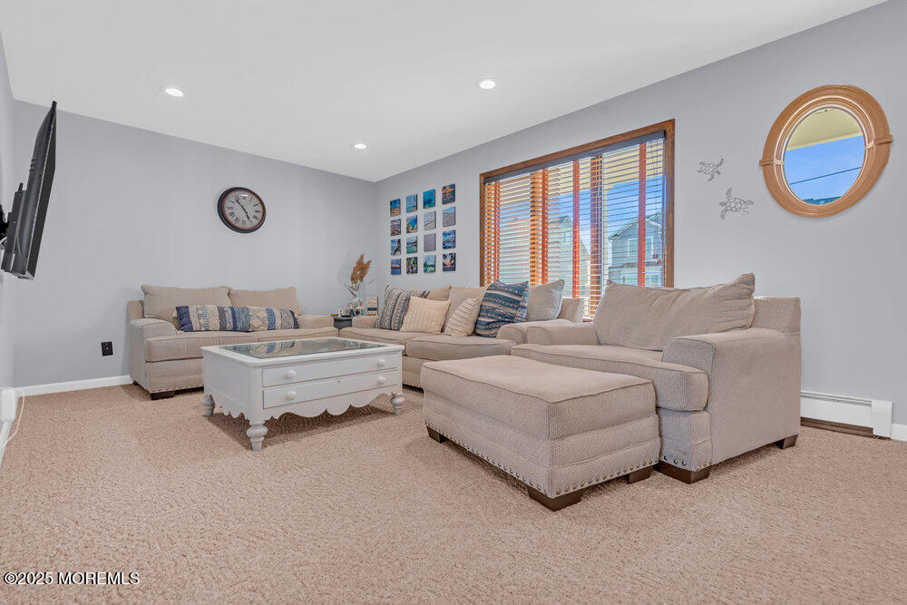 826 Forepeak Drive Forked River, NJ 08731 - Photo 5 of 56 a living room with furniture and a large window