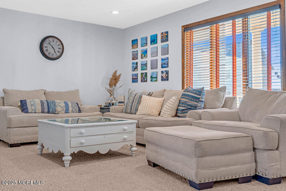 826 Forepeak Drive Forked River, NJ 08731 - Photo 7 of 56 a living room with furniture and a large window