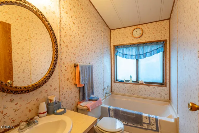 a room with furniture and a chandelier