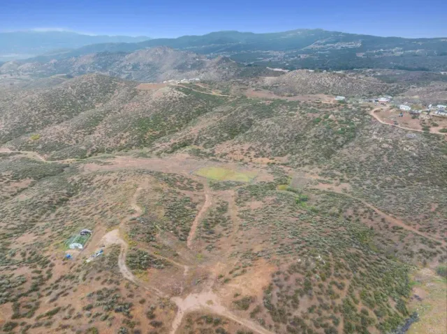 a view of lake with mountain