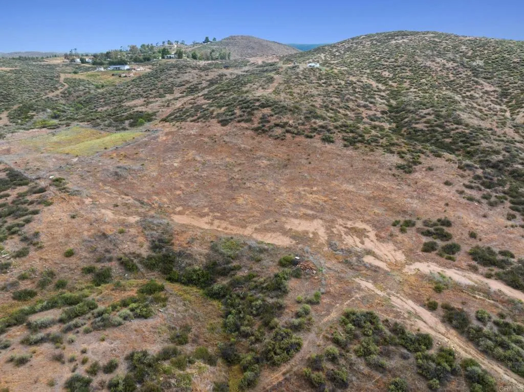 0 Ravenna Lane Rancho Cucamonga, CA 91737 - Photo 39 of 47 a view of a dry yard with mountains in the background
