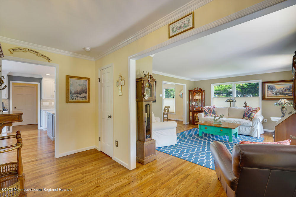 802 Wall Road Spring Lake Heights, NJ 07762 - Photo 13 of 27 a living room with furniture and a table