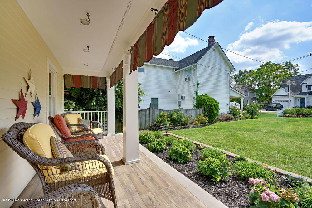 802 Wall Road Spring Lake Heights, NJ 07762 - Photo 2 of 27 a view of a patio with chair and garden