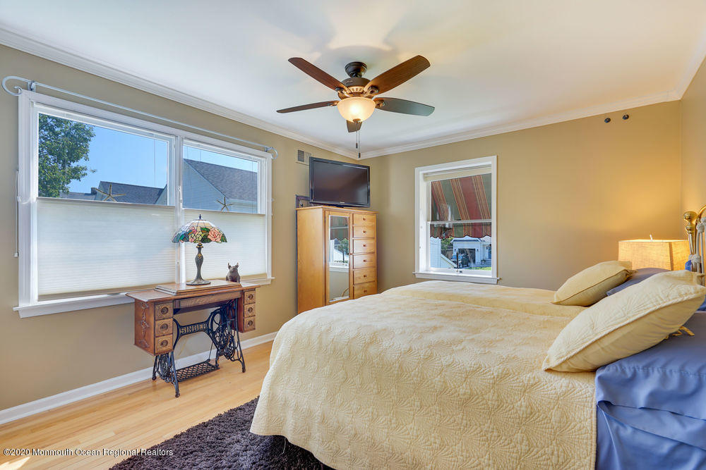 802 Wall Road Spring Lake Heights, NJ 07762 - Photo 21 of 27 a bedroom with a bed and a desk
