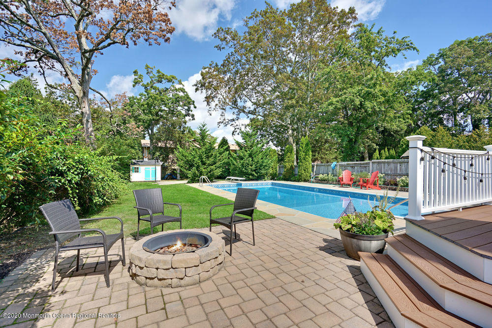 802 Wall Road Spring Lake Heights, NJ 07762 - Photo 25 of 27 a view of a chairs and table in the backyard