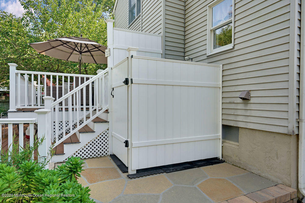 802 Wall Road Spring Lake Heights, NJ 07762 - Photo 26 of 27 a view of a house with backyard and deck