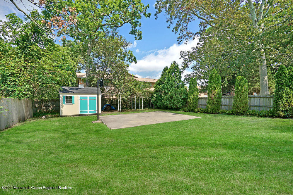 802 Wall Road Spring Lake Heights, NJ 07762 - Photo 27 of 27 a view of a backyard with a garden