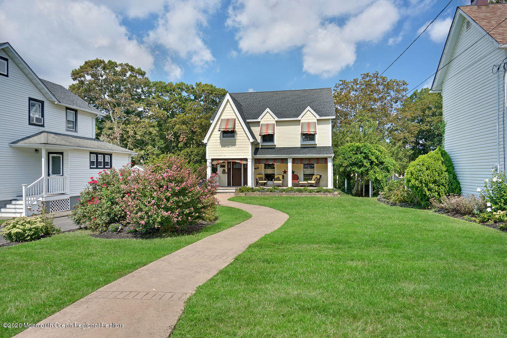 802 Wall Road Spring Lake Heights, NJ 07762 - Photo 3 of 27 a front view of a house with a yard