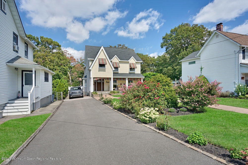 802 Wall Road Spring Lake Heights, NJ 07762 - Photo 5 of 27 front view of a house with a yard