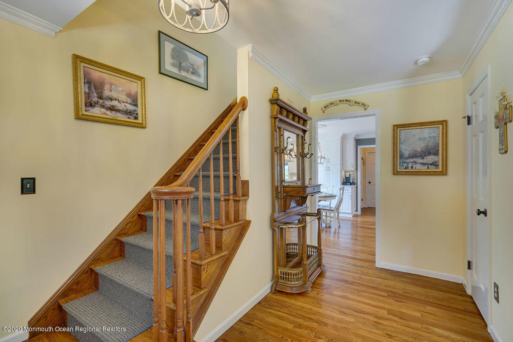 802 Wall Road Spring Lake Heights, NJ 07762 - Photo 6 of 27 a view of entryway and hall with wooden floor