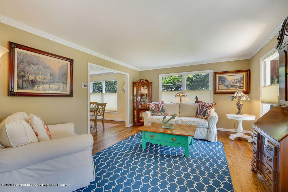 802 Wall Road Spring Lake Heights, NJ 07762 - Photo 7 of 27 a living room with furniture and a large window