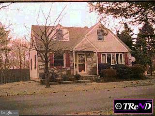 1508 Church Road Oreland, PA 19075 - Photo 1 of 1 a front view of a house with a yard