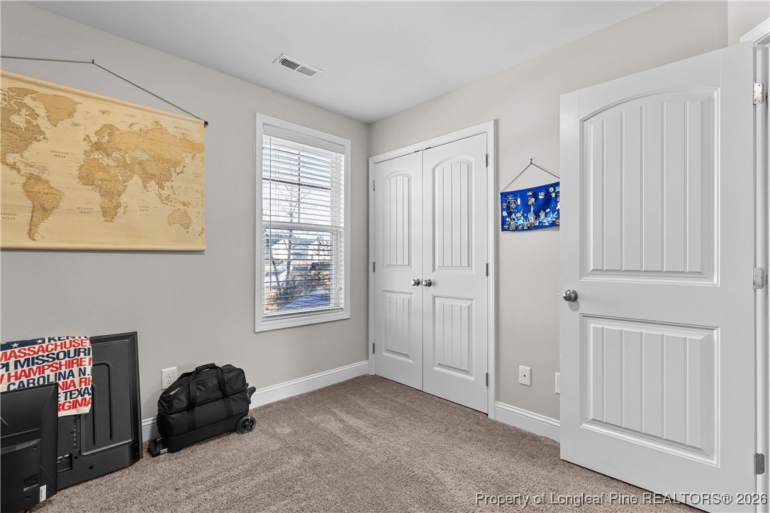 1908 Sweetfern Place Aberdeen, NC 28315 - Photo 25 of 46 a bedroom with a bed and a window