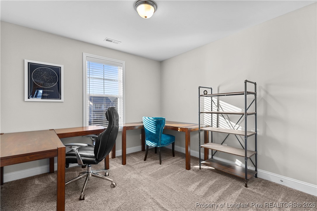 1908 Sweetfern Place Aberdeen, NC 28315 - Photo 27 of 46 a workspace with furniture and a window