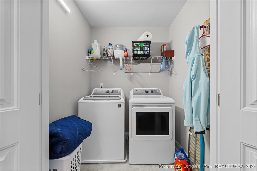 1908 Sweetfern Place Aberdeen, NC 28315 - Photo 31 of 46 a utility room with dryer and washer