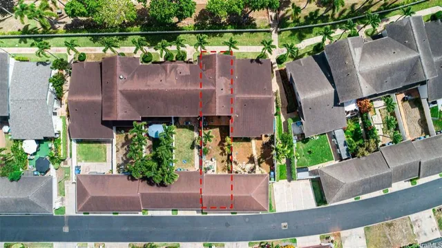 a view of house with a garden and outdoor seating