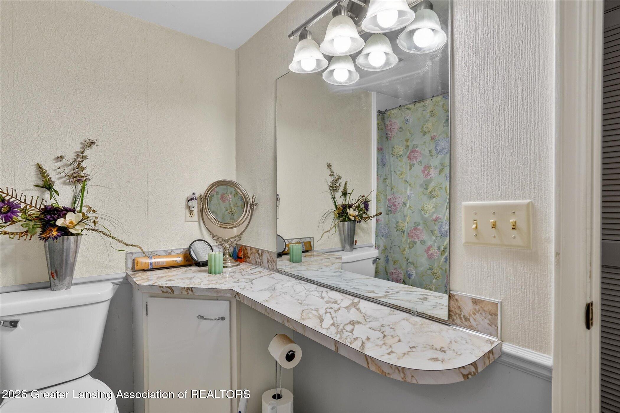 4809 Gull Road, Unit 23 Lansing, MI 48917 - Photo 19 of 26 19-4809-Gull-Rd-apt-23-WindowStill-Real-