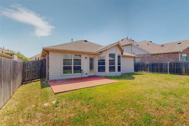 a view of a house with swimming pool and porch