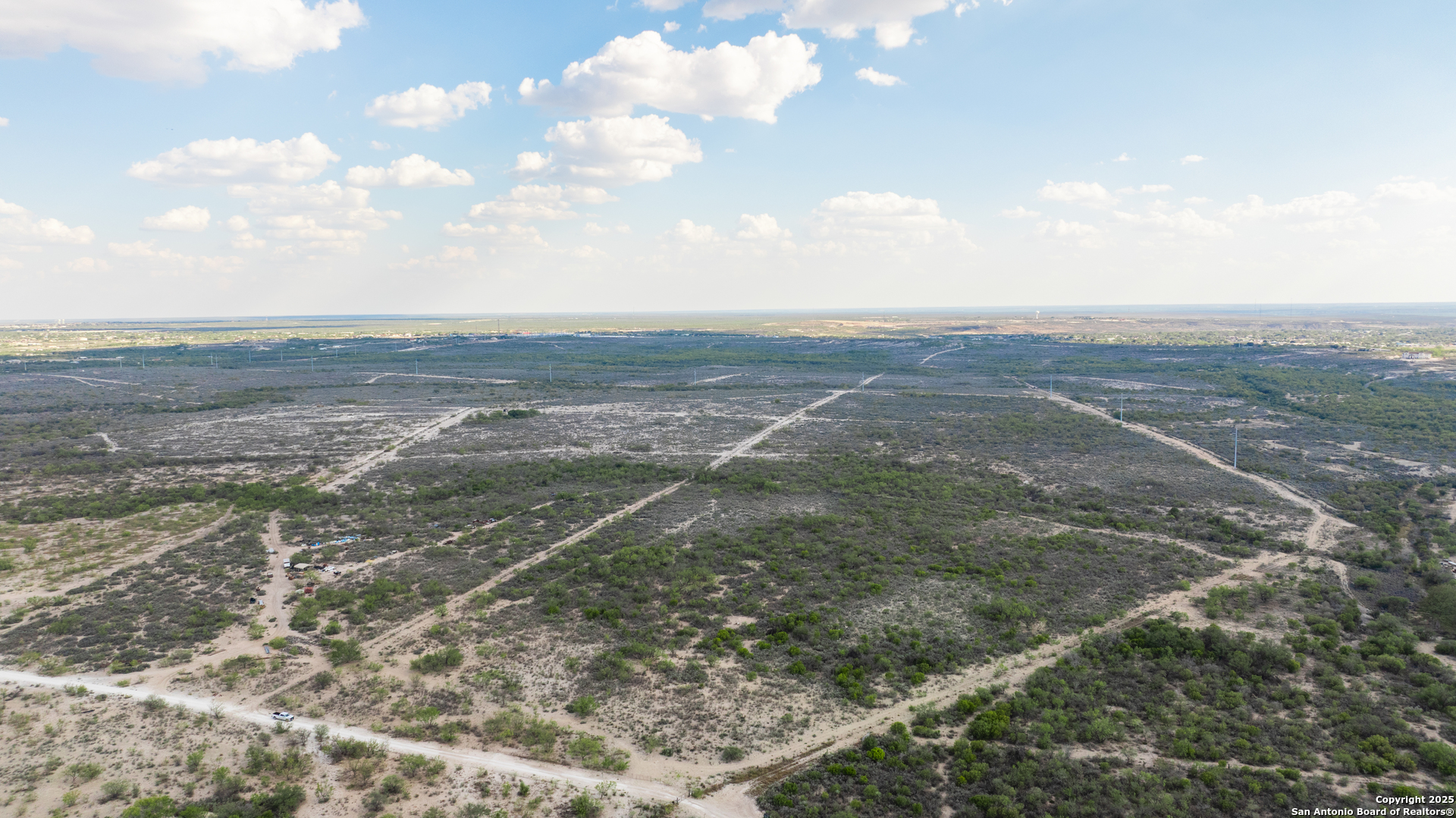 2212 Lausen Road Del Rio, TX 78840 - Photo 2 of 15 a view of a field with an ocean