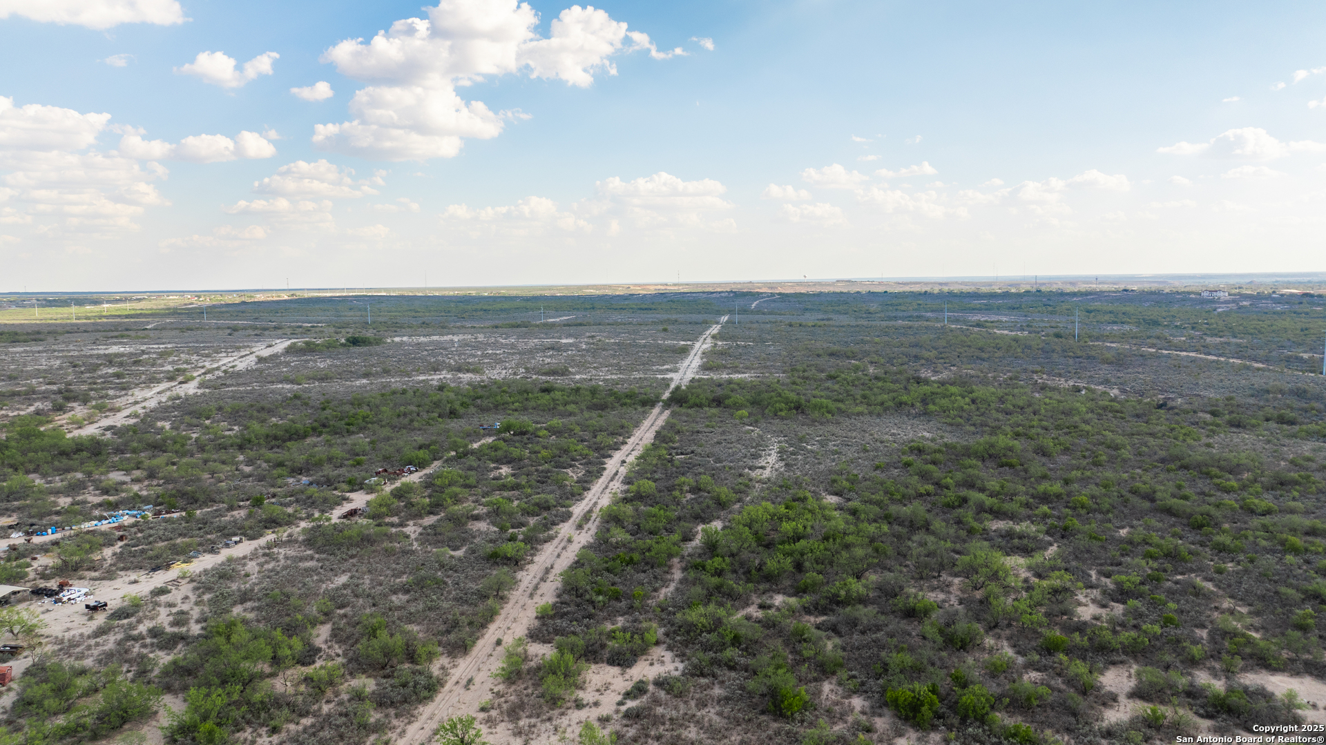2212 Lausen Road Del Rio, TX 78840 - Photo 4 of 15 a view of a big yard with lots of green space